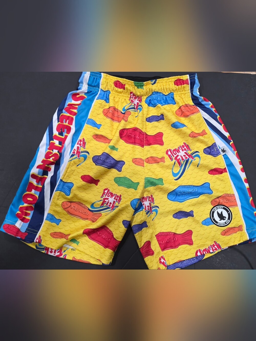 Kids Yellow Swim Shorts with Multicolor Fish Print